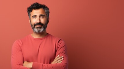 Obraz premium Middle age hispanic man with beard standing over isolated background