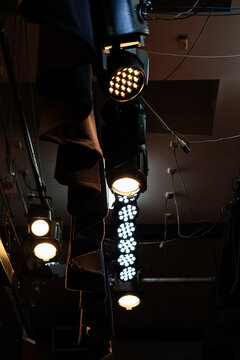 Looking up at illuminated Stage lighting at concert venue