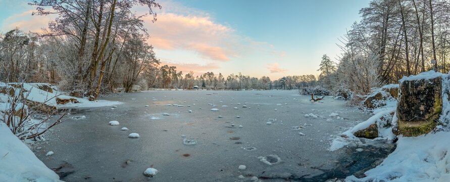 Picture of a frozen pond in the morning light