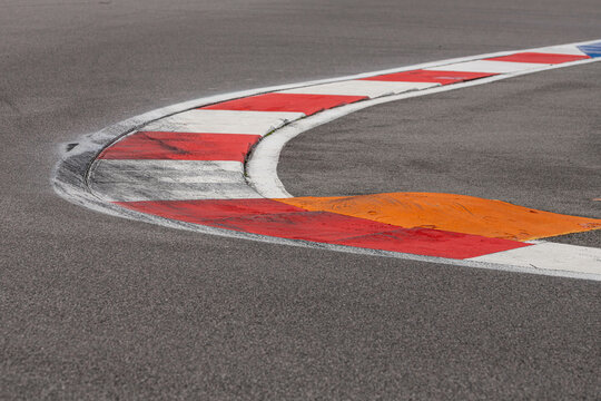 Close-up of the empty asphalt of an international race track. Race track of a car, motorcycle