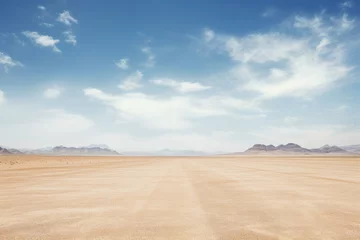 Fotobehang empty road in desert landscape on sunny day © krissikunterbunt
