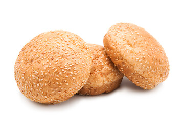 Sesame burger bun isolated on white background. Clipping path.	