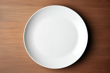 White plate and dimmed light, minimalist style, the plate stands on the table, space for text
