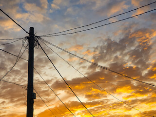 Power electric pole with line wire on colored background close up. Photography consisting of power...
