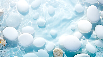 Transparent Clean Blue Water with Smooth Stones and Pebbles at the Bottom. Spa Salon Concept.