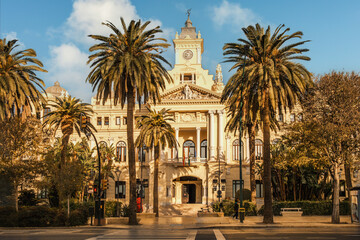 Malaga City Hall (Casa Consistorial de Malaga), also known as La Casona del Parque (Mansion of the Park), Malaga, Spain. Inaugurated in 1919, it is a Baroque Revival building. - obrazy, fototapety, plakaty