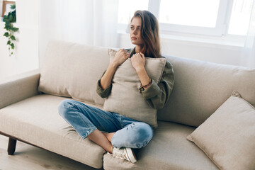 Lonely Woman on Couch: Stress, Depression, and Anxiety in Home