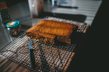 Freshly baked cake being cut