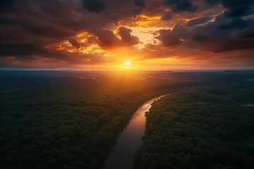 Fotobehang Drone shot at sunset over a rainforest with a river © Herzog