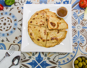 Mahyawa or mehyawa arayes and arias paratha bread with fermented fish sauce served in dish isolated on table top view of arabic food - obrazy, fototapety, plakaty