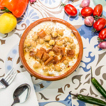 Fattah Hummus served in dish isolated on table top view of arabic food