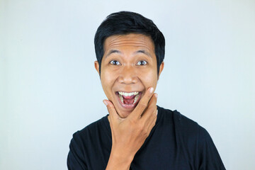 head shot wow facial expression smiling asian man looking at the camera, isolated white background