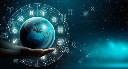 Astrological zodiac signs inside of horoscope with planet Earth in hand. Knowledge of the stars in the sky. The power of the universe concept. Elements furnished by NASA.
