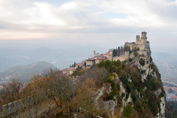 Fototapeta na wymiar The Guaita, also known as the Rocca or the First Tower. It is one of three towered peaks overlooking the city of San Marino. The fortress is the oldest and the most famous constructed on Monte Titano.