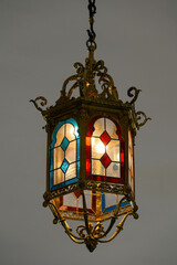 Fototapeta na wymiar Old lamp with stained glass