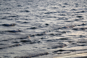 Bright blue sea surface, close-up.