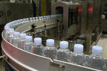 Drinking water bottle on a factory production conveyor belt line