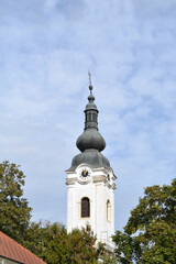 Fototapeta na wymiar Bell tower of the Church of St. Peter in Ivanic-Grad in Croatia
