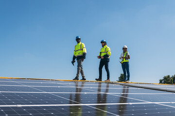 Service engineer checking solar cell on the roof for maintenance if there is a damaged part. Engineer worker install solar panel. Clean energy concept.
