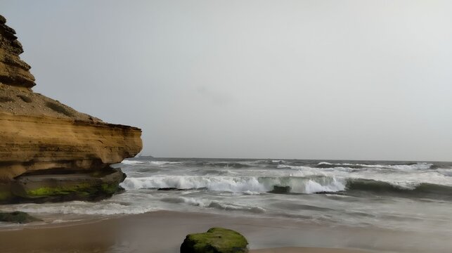waves crashing on rocks at manora beach