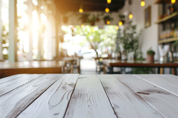 Closeup of white wooden table, cafe and bar on background