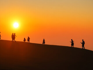 Fototapeta na wymiar Tourists go up the hill in the sunrise Generative Ai