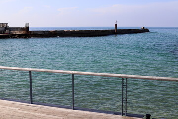 A pier for mooring boats and yachts in the port of Tel Aviv.