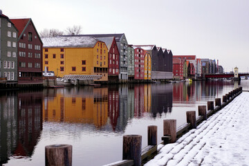 Colorful old houses on the water in Trondheim Norway in winter
