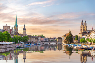 Aerial view on the downtown of Zurich at sunset and its reflection, Switzerland