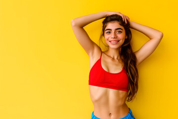 Obraz premium A Happy Young Woman in Red and Blue Against a Luminous Yellow Background - Embracing the Vibrant Colors of Spain, Colombia, and Venezuela. Ample Copy Space for Your Positive Message