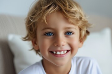 Happy boy with beautiful white milk toothy smile, child dental care and stomatology