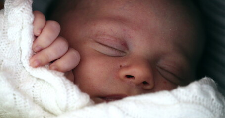 Baby sleeping inside crib newborn infant close-up portrait asleep