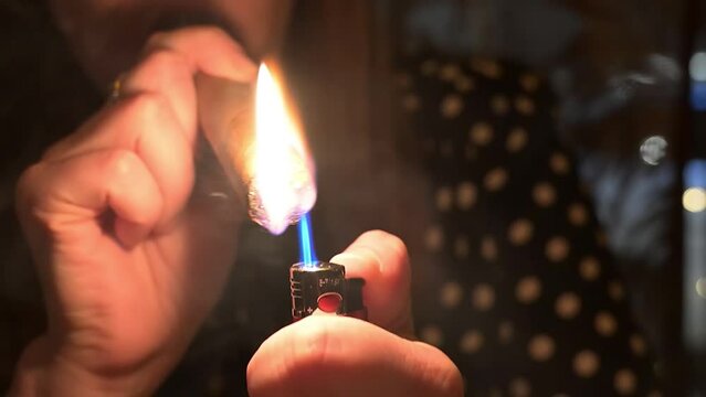 Female Lighthing Cigar Video with Flame