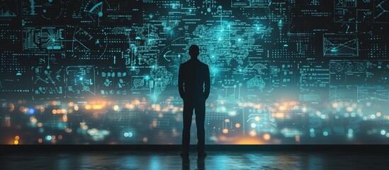 Man silhouette standing before a vast display of glowing data visualizations and technical schematics. A society controlled by technology concept and risk of manipulation