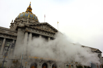 San Francisco, California: San Francisco City Hall with steam rises from the street - 726698568