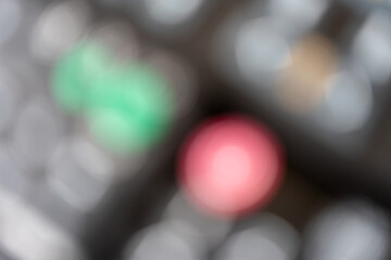Electronic device background. Green on and red off buttons. Technology concept. Defocused...