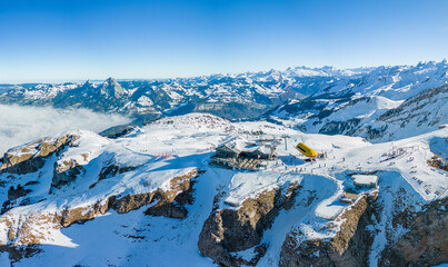 Aerial drone view of snow covered ski slopes at Stoos,Switzerland - obrazy, fototapety, plakaty