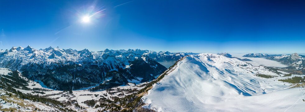 Aerial drone view of snow covered ski slopes at Stoos,Switzerland
