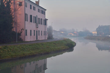 Sunrise by a canal