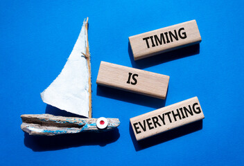 Timing is Everything symbol. Wooden blocks with words Timing is Everything. Beautiful blue...