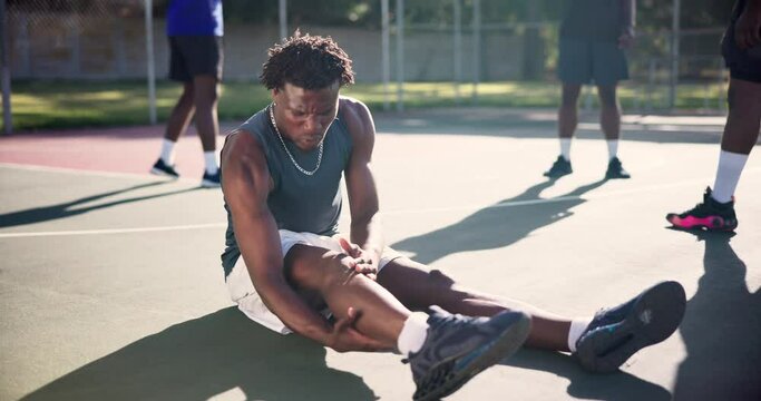Sports, knee pain and injury with black man on basketball court for muscle sprain, arthritis and fibromyalgia. Training, body tension and accident with person and inflammation for hurt anatomy