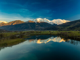 Aerial drone view of Lac de Passy lake in Domancy, France
