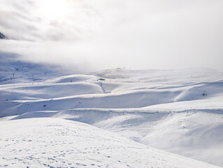 Mountains and skiing in Les Contamines, French alps.