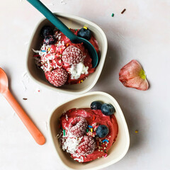 ice cream and fresh berries in a bowl. delicious and healthy dessert