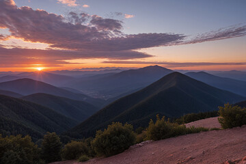 Beautiful sunset sky in the clouds on top of forested mountains