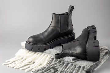 Trendy fashionable black leather short women pair chelsea boots with rough sole and alpaca wool...