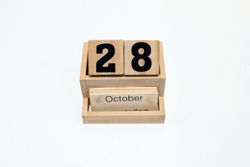 28th of October wooden perpetual calendar. Shot close up isolated on a white background 