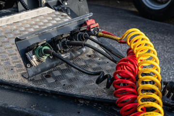 Connectors and brake lines of a freight trailer.