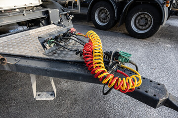 Connectors and brake lines of a freight trailer.