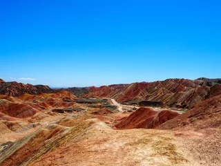 Papier Peint photo autocollant Zhangye Danxia Tilted colourful rock formation in The Rainbow Mountains of China within the Zhangye Danxia Landform Geological Park
